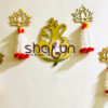 Gold Ganesha Cutout and Lotus Hangings.