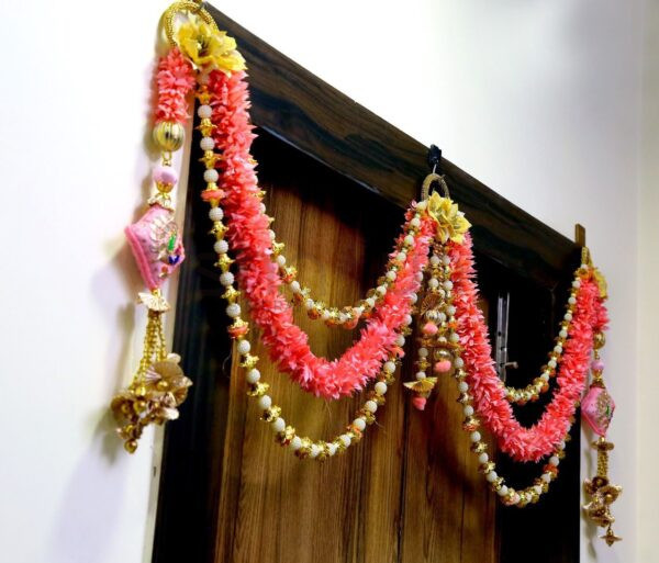 Pink Gajra Toran With Peacock Hangings.