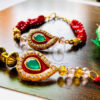Red Paan Couple Rakhi Set