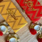 Stone  Diya Hamper with red Flower